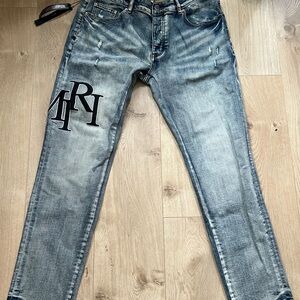 AMIRI Faded Blue Slim Jeans